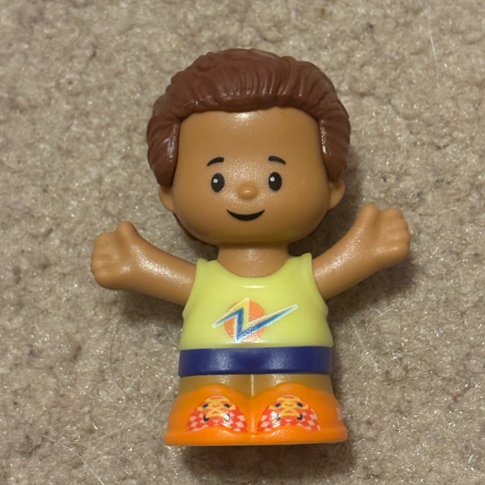 NWOT Little People little boy with brown skin and hair and yellow shirt figurine